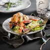Vesela de masă modernă din marmură populară din Marea Britanie. Farfurii din ceramică gri pentru restaurante