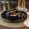 Farfurie restaurant neagra din ceramica cu margine aurie 